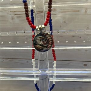 Red and White Beaded Jewelry Necklace with Circular Pendant. 22” necklace